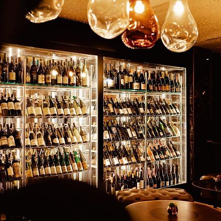 Hilton Rijeka Costabella Beach Resort And Spa Luaran gambar Wine display at the restaurant